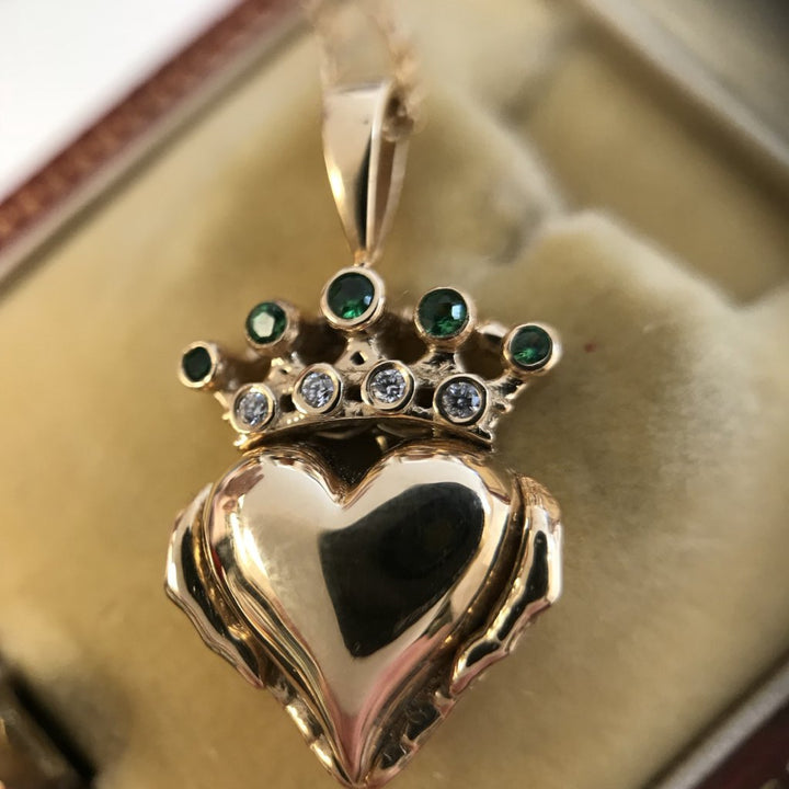 Irish Claddagh pendant necklace with green and white gemstones
