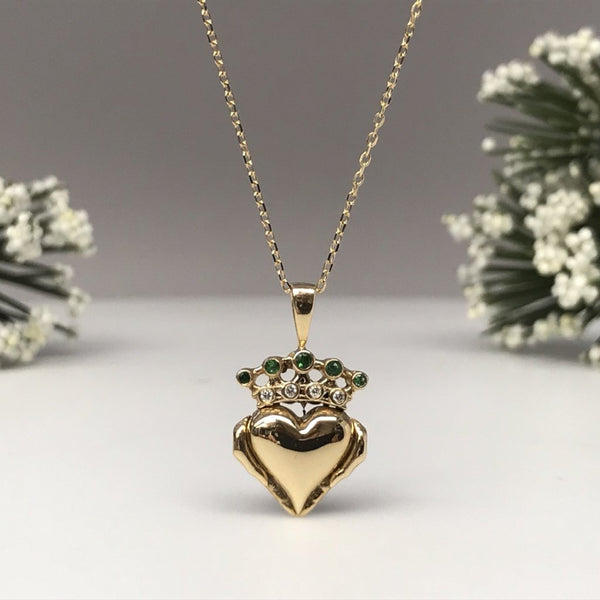 Irish Claddagh pendant necklace with green and white gemstones