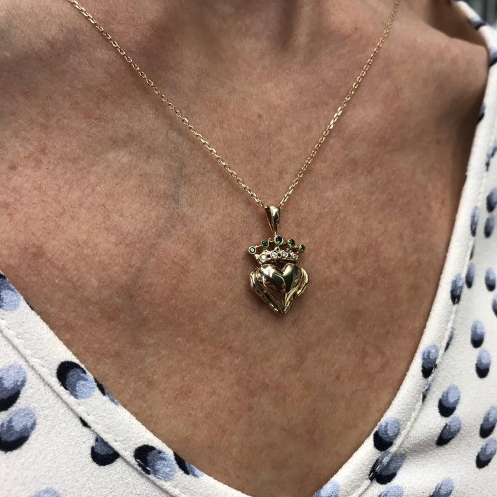 Irish Claddagh pendant necklace with green and white gemstones