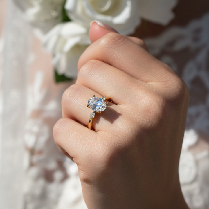 Oval Solitaire with Marquis diamonds in the band 